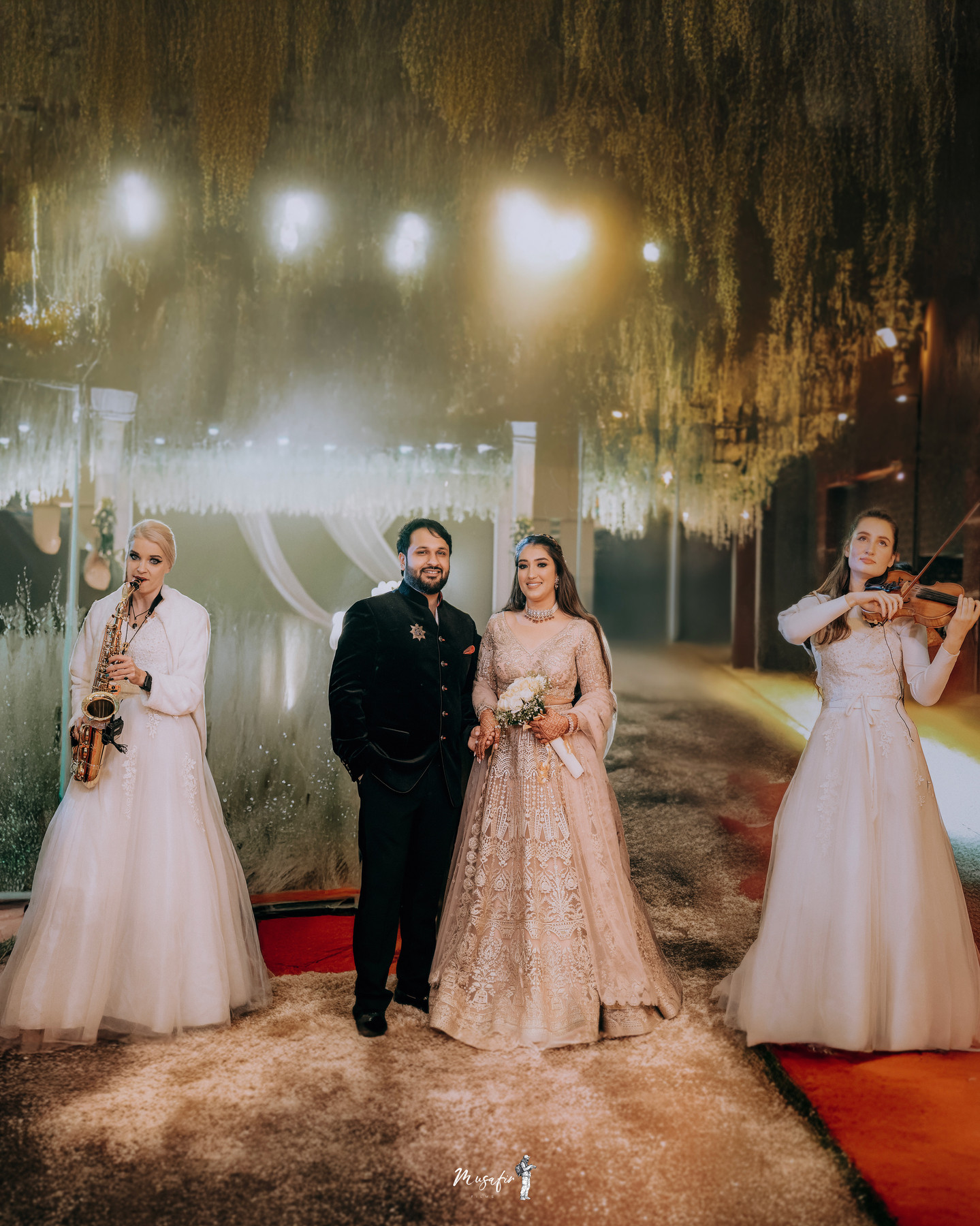 A couple together among wedding musicians